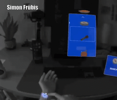 Animation of Simon Frübis using hand gestures and a haptic wristband to browse a floating XR menu